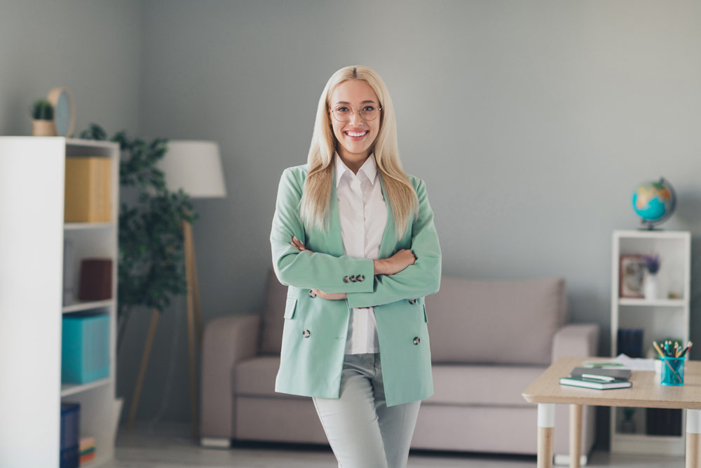 Real Estate Agent With Arms Folded