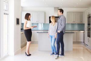 Real Estate Agent With Couple